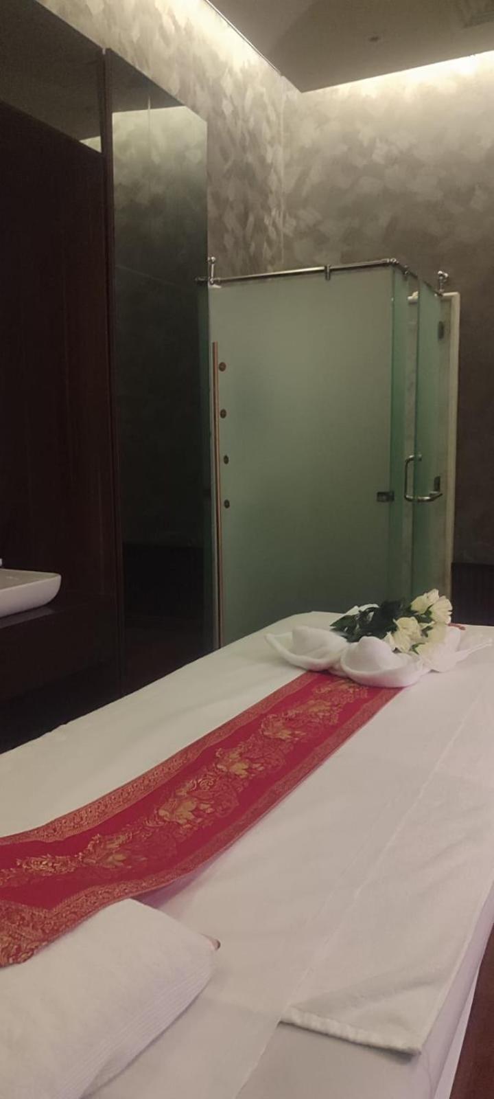 Waterfront Hotel Apartment Lusail 외부 사진 A shower cubicle in a Thai spa